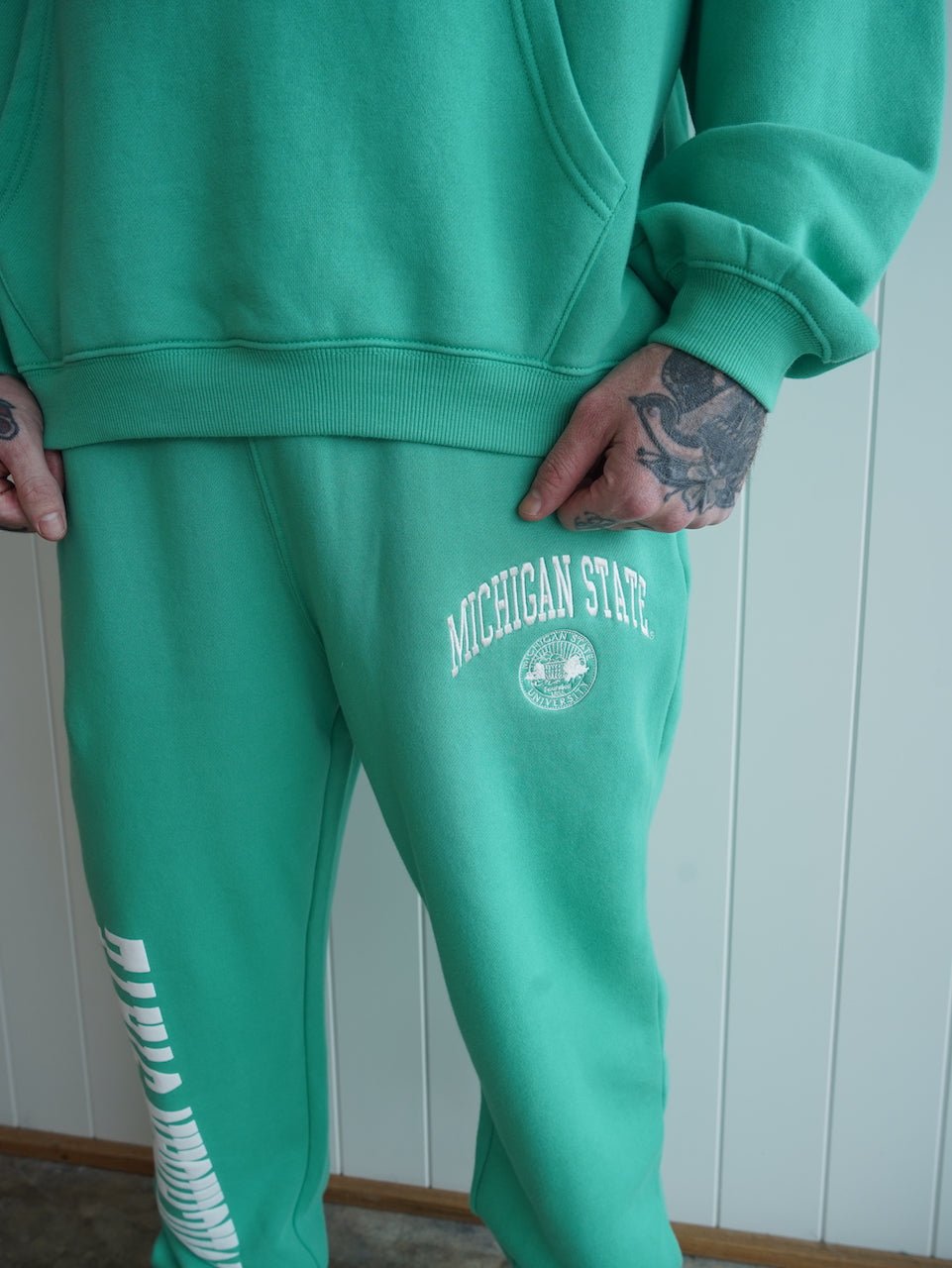 MICHIGAN STATE UNIVERSITY ARCH TRACK PANT - SUNDAY BEST TRADING CO